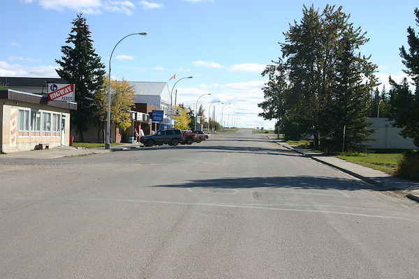 Main street in Wildwood, Alberta, with small shops and prairie town charm.