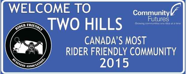 Welcome sign in Two Hills, Alberta, recognizing the town as Canada’s Most Rider Friendly Community 2015.